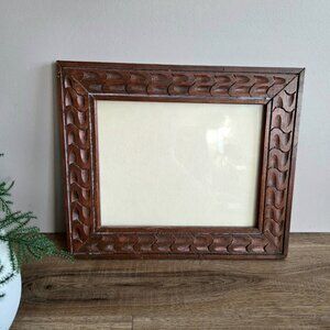 Vintage hand carved wooden picture frame.